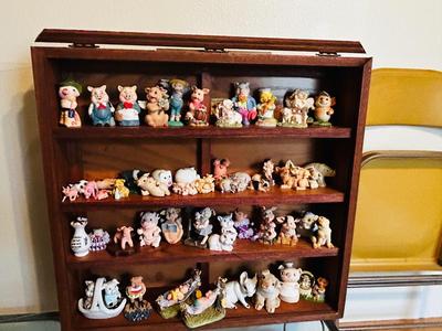 DISPLAY CASE PACKED FULL OF PIGS