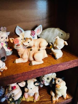 DISPLAY CASE PACKED FULL OF PIGS