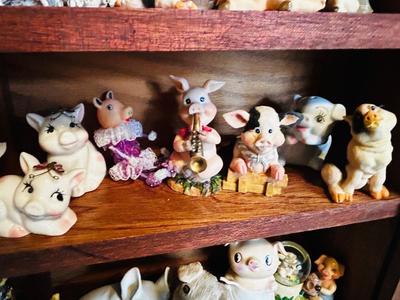 DISPLAY CASE PACKED FULL OF PIGS