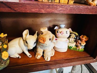 DISPLAY CASE PACKED FULL OF PIGS