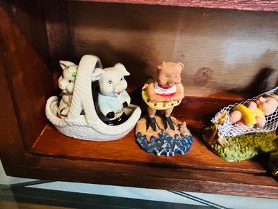 DISPLAY CASE PACKED FULL OF PIGS
