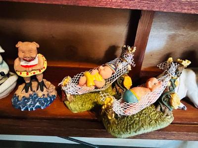 DISPLAY CASE PACKED FULL OF PIGS