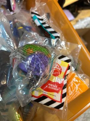 SO MANY HAPPY MEAL TOYS IN PACKAGES