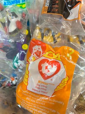SO MANY HAPPY MEAL TOYS IN PACKAGES