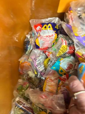SO MANY HAPPY MEAL TOYS IN PACKAGES