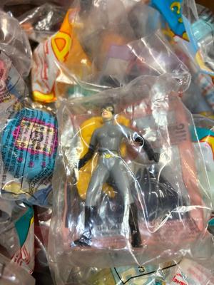 SO MANY HAPPY MEAL TOYS IN PACKAGES