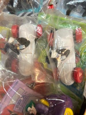 SO MANY HAPPY MEAL TOYS IN PACKAGES