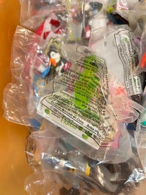 SO MANY HAPPY MEAL TOYS IN PACKAGES