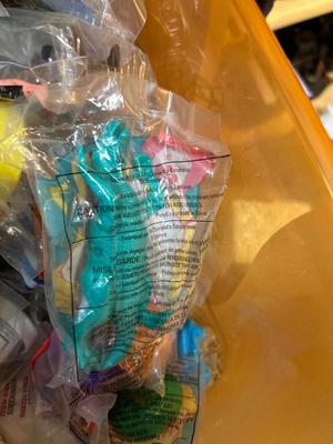 SO MANY HAPPY MEAL TOYS IN PACKAGES