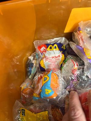 SO MANY HAPPY MEAL TOYS IN PACKAGES