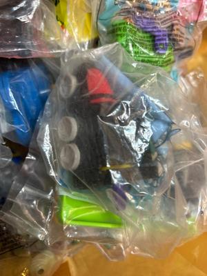 SO MANY HAPPY MEAL TOYS IN PACKAGES