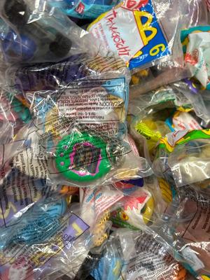 SO MANY HAPPY MEAL TOYS IN PACKAGES