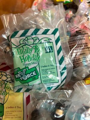 SO MANY HAPPY MEAL TOYS IN PACKAGES