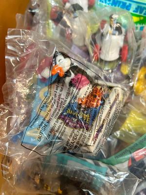 SO MANY HAPPY MEAL TOYS IN PACKAGES