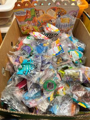 SO MANY HAPPY MEAL TOYS IN PACKAGES