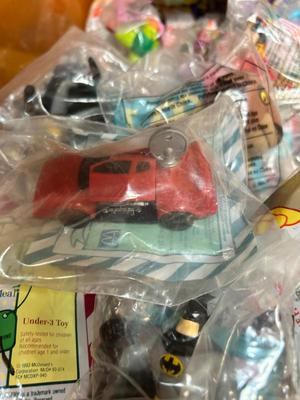 SO MANY HAPPY MEAL TOYS IN PACKAGES