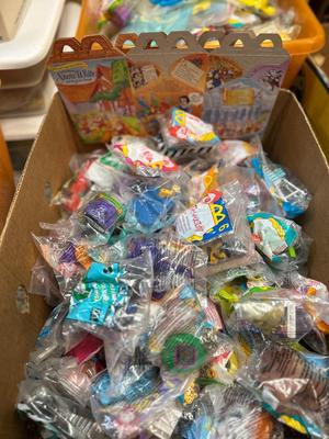 SO MANY HAPPY MEAL TOYS IN PACKAGES