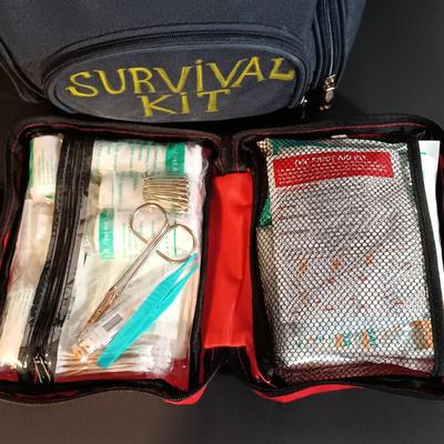LOT 396: Survival Kit Backpack with New in Package Items