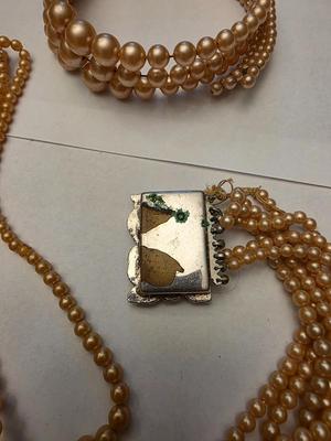 Two necklaces and a bracelet