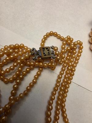 Two necklaces and a bracelet