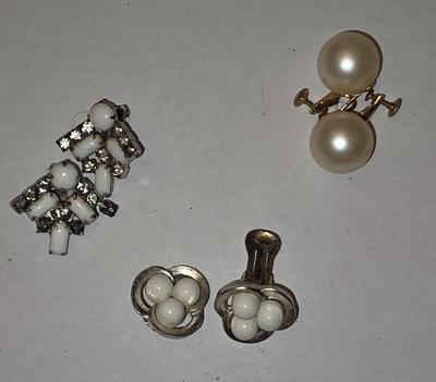 Three pair clip on earrings.