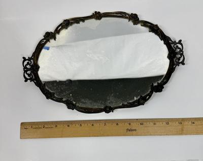 Sale Photo Thumbnail #472: Ornate metal frame, mirror measures approx. 8" x 14". See photos for condition.