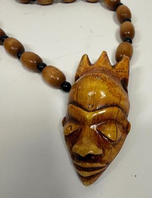 Beaded Wood Necklace with Evil Queen/Sorcerer type face pendant necklace