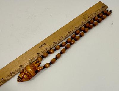 Beaded Wood Necklace with Evil Queen/Sorcerer type face pendant necklace