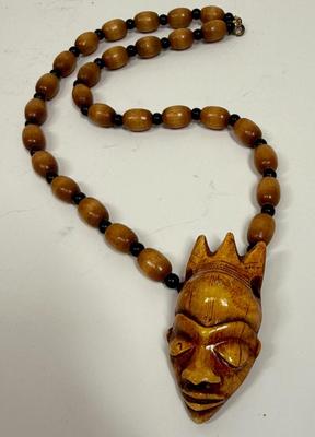 Beaded Wood Necklace with Evil Queen/Sorcerer type face pendant necklace