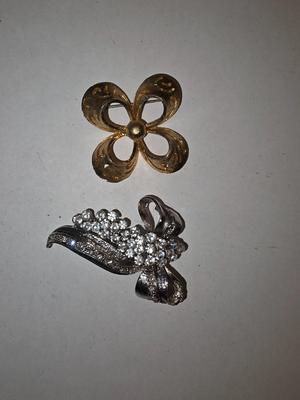 Pair of brooches