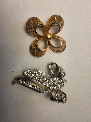 Pair of brooches
