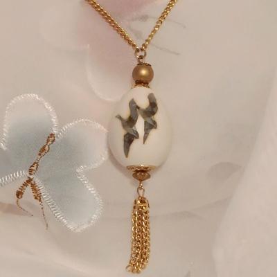 LOT 421: Handpainted Egg Necklace, Faux Pearl and Gold-Tone Necklace, Revlon Love-Pat Misty Rose Compact & More