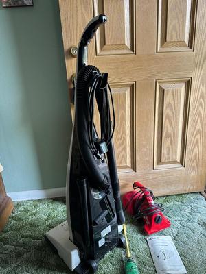RICCAR VIBRANCE UPRIGHT VACUUM AND A ROYAL HAND VACUUM