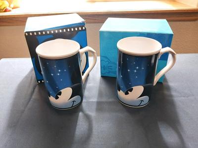 TWO MICKEY MOUSE CUPS FROM THE DISNEY STORE