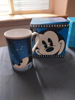 TWO MICKEY MOUSE CUPS FROM THE DISNEY STORE
