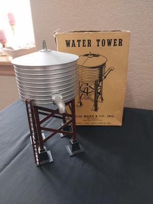 CASTIRON TRACKTOR AND LOUIS MARK WATER TOWER