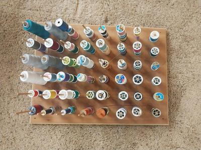 PEG THREAD HOLDER AND THREADS