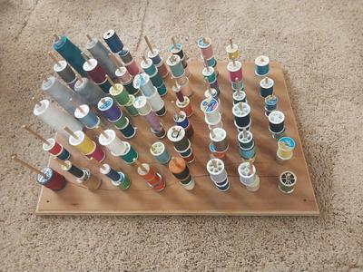 PEG THREAD HOLDER AND THREADS