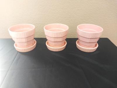 THREE SMALL PLANTING POTS BY Mc COY