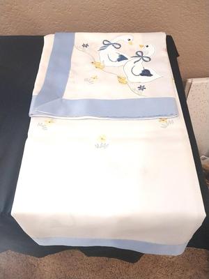 CERAMIC DUCKS AND SMALL TABLE COVER
