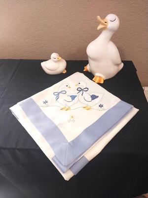 CERAMIC DUCKS AND SMALL TABLE COVER