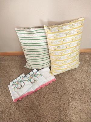 TWO FEATHER PILLOWS AND EMBROADERED PILLOWCASES