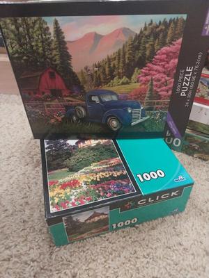 TWELVE PUZZLES MOST ARE 1000 PIECES