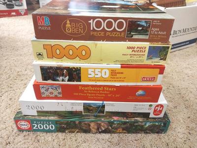 TWELVE PUZZLES MOST ARE 1000 PIECES