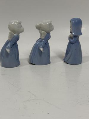Sale Photo Thumbnail #153: Vintage Inarco Japan Kissing Boy and Girl Angel Figurines and Praying Nun Porcelain Figurine Blue Girl Religious 3.5". All appear to be in good condition.
