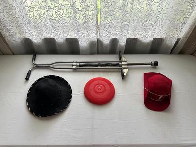POGO STICK, CHILD'S HATS AND A FRISBEE