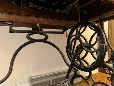 BRUNSWICK TREADLE SEWING MACHINE IN CABINET