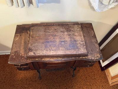 BRUNSWICK TREADLE SEWING MACHINE IN CABINET