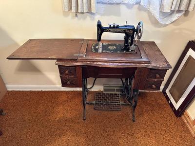 BRUNSWICK TREADLE SEWING MACHINE IN CABINET