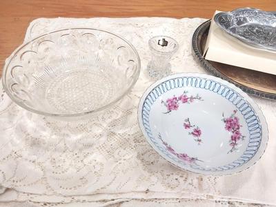 VARIETY OF BOWLS-CANDLE HOLDERS AND LACE LIKE TABLECLOTH